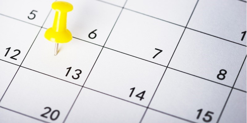 Calendar with yellow pin in date