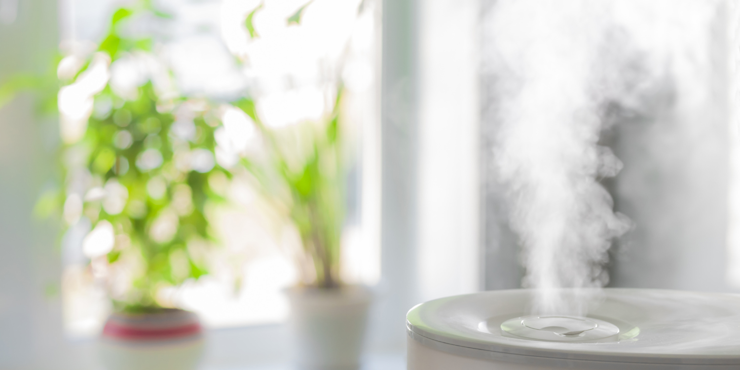 Steam coming from a portable humidifier - Furnace Humidifier vs. Portable Unit: Which is Right for Your Home?